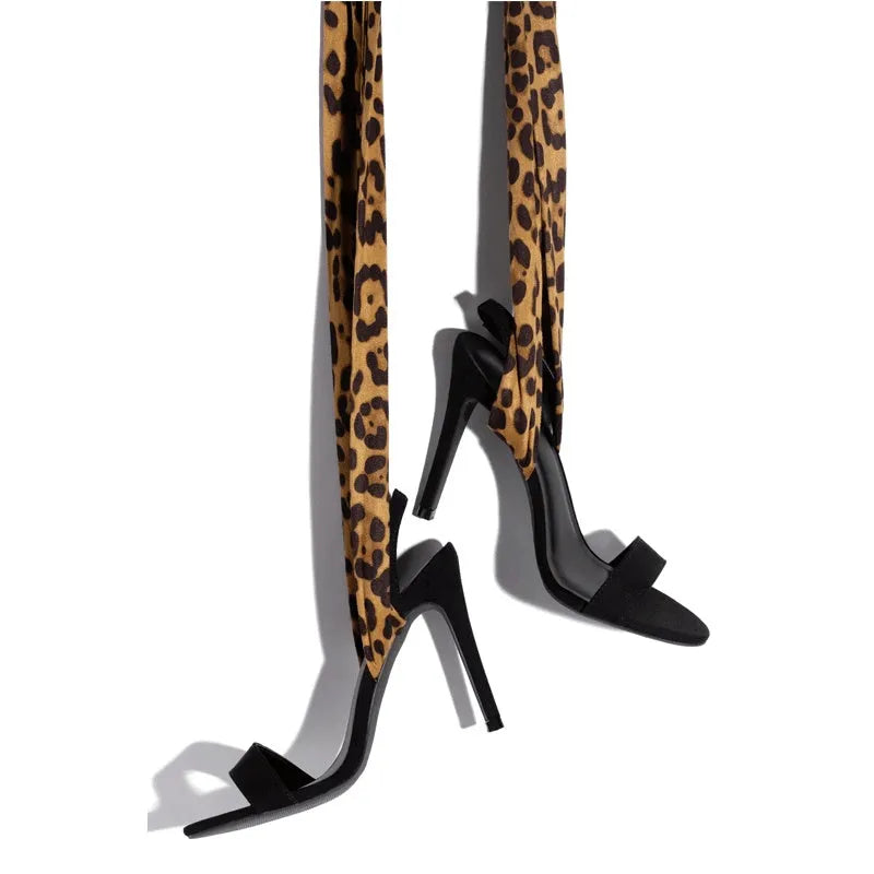 Light brown women's high heel sandals with leopard print, cross straps, and a thin high heel