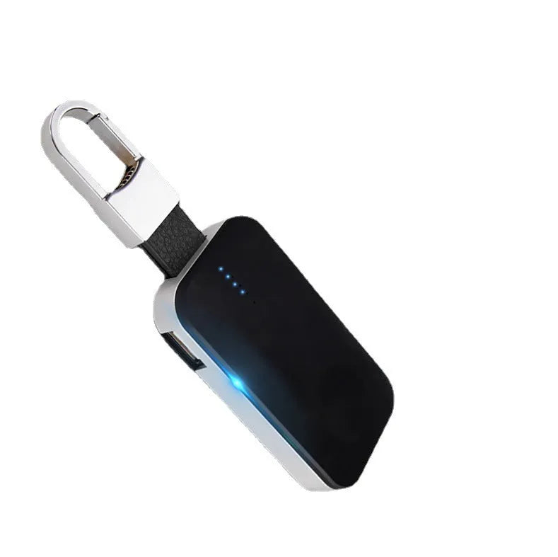 Black Apple Watch portable power bank keychain charger showing compact 127mm design