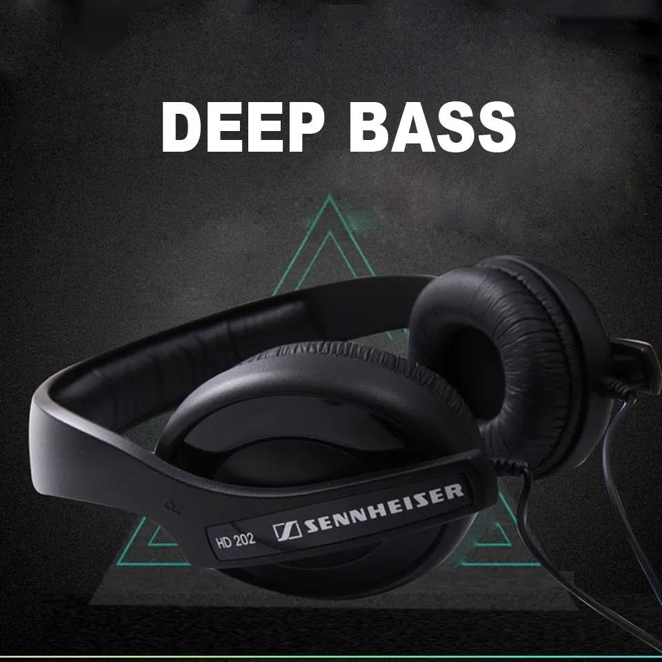 Black wired head-mounted monitor headphones with attached microphone and 3.5mm plug on white background