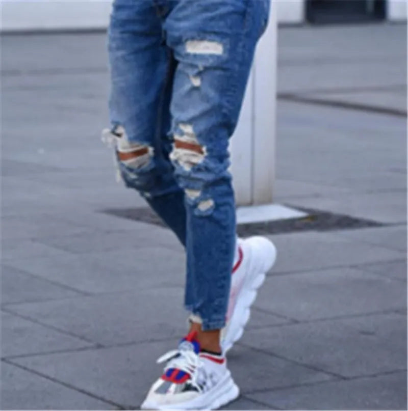 Men's distressed hole jeans in deep blue with slim fit and cotton fabric