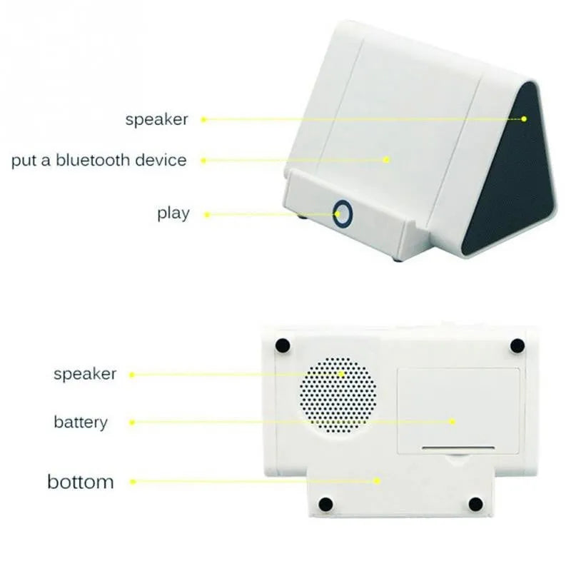 Compact black and white wireless Bluetooth speaker with rechargeable battery