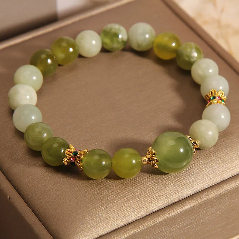 Women's jade green bracelet made from Xiuyan jade stone with adjustable cord