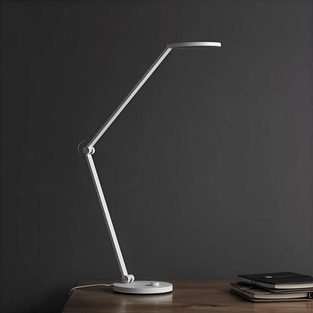 ProLED folding intelligent eye protection table lamp on a desk, with adjustable colour temperature and Wi-Fi Bluetooth connectivity