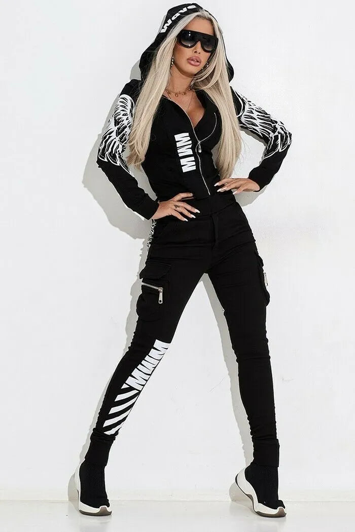 Black women's printed polyester hooded casual suit with zip top and matching trousers on a model