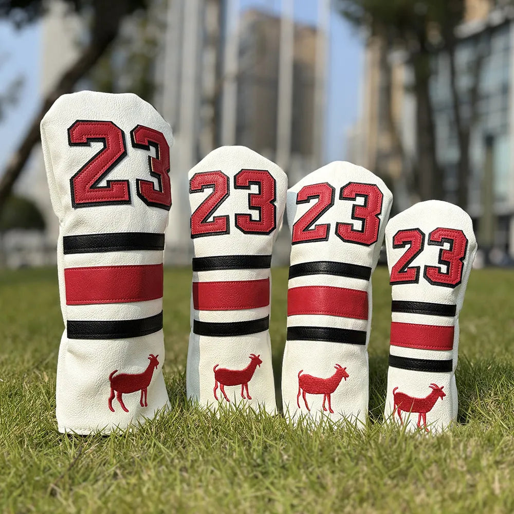 Set of PU golf club head covers in various colours including red, black, white, and yellow sleeves for woods and a square putter