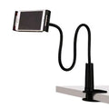 Black bedside oversize flat panel handset holder with long arm extended, holding a mobile phone.