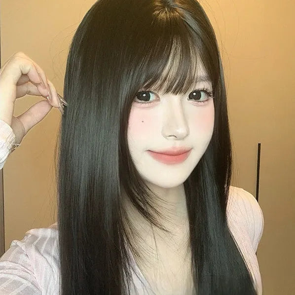 Dark brown long straight hair wig with bangs on a wig stand, full-head design, high temperature fibre