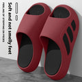 Men's EVA flip flops with letter print, brown colour, on a wooden floor