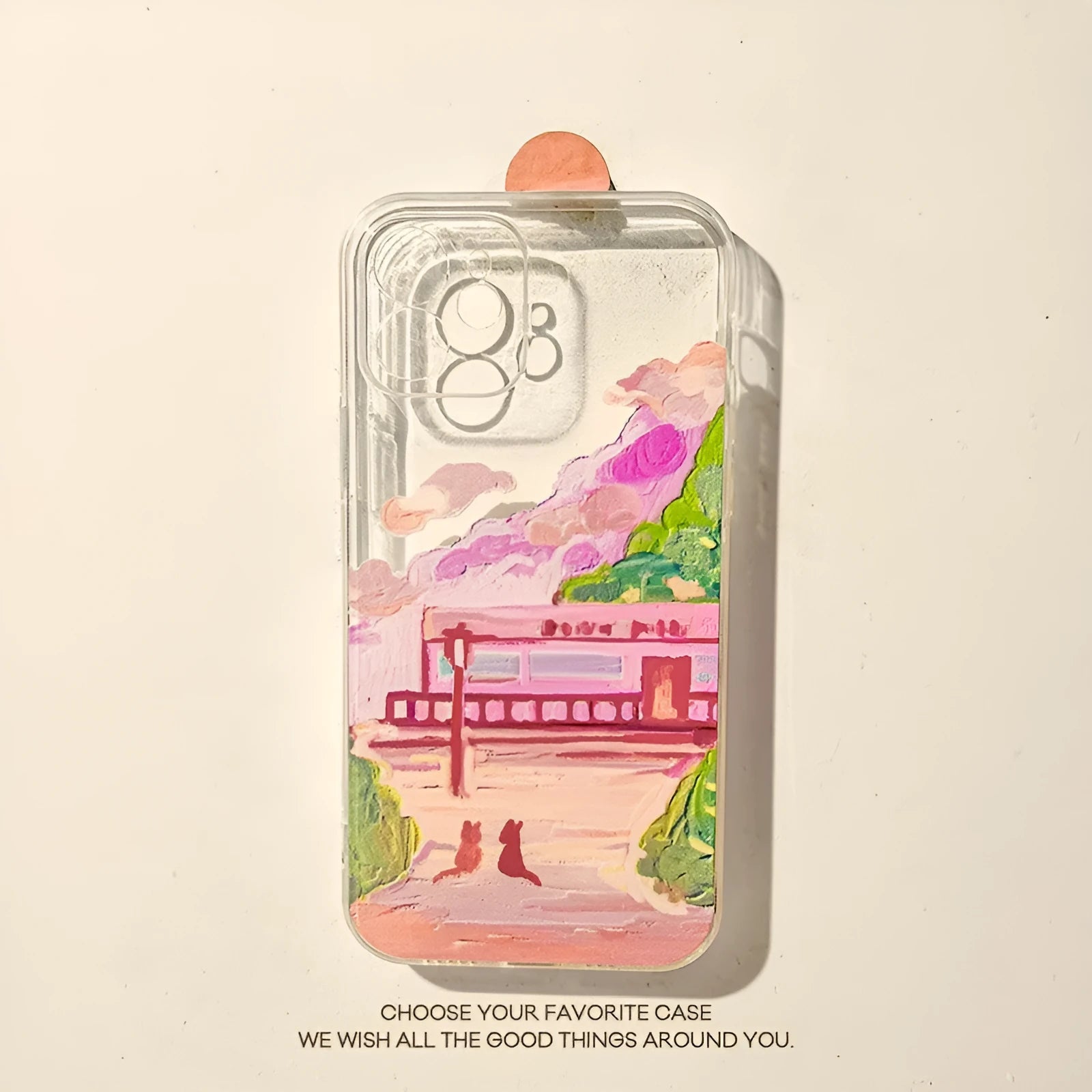 Soft silicone iPhone case showing colourful cartoon illustration of two cats on the back