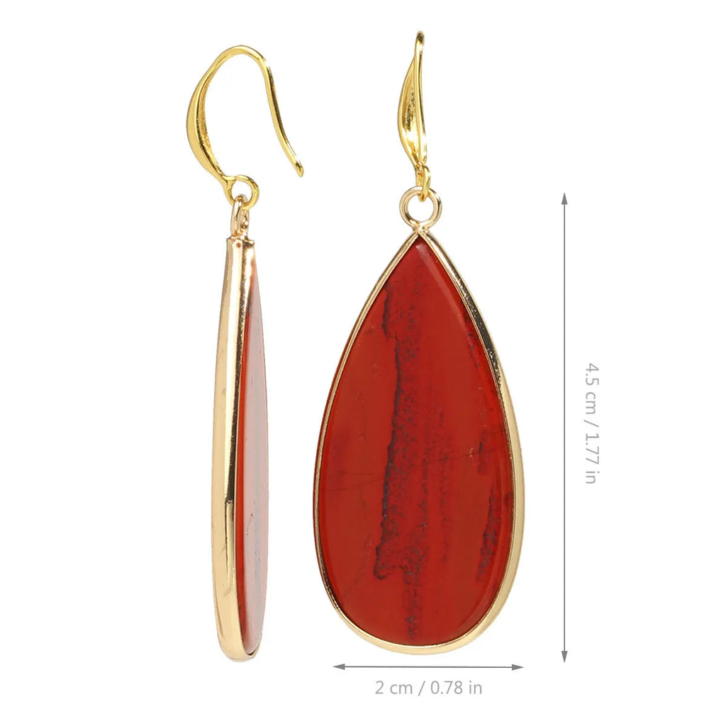 Vintage long water drop earrings in natural stone with textured surface and retro style