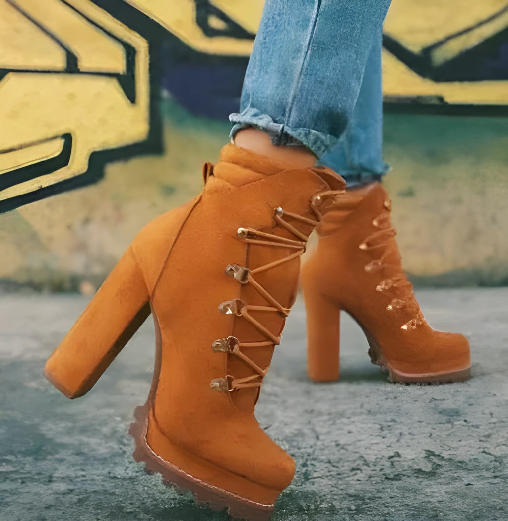 Women's army green suede ankle boots with a thick high heel and round toe.