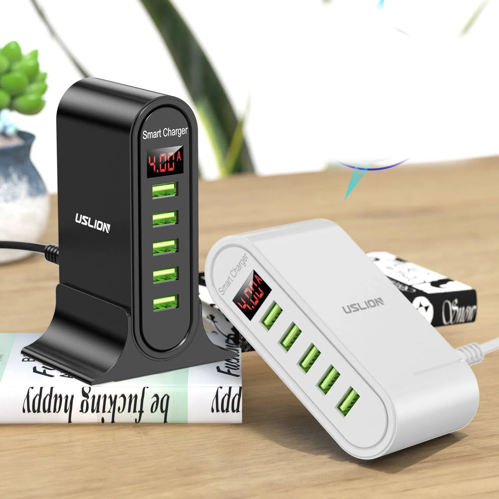 Black and white USB chargers with LED digital displays showing EU, UK, and US plug styles.