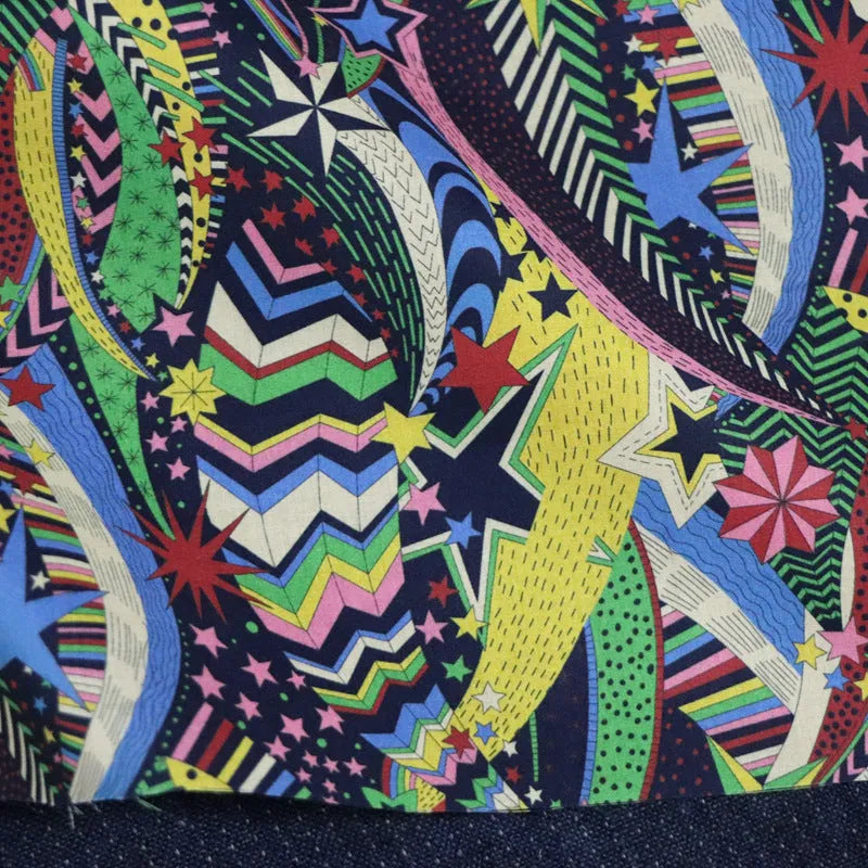 Blue high-count cotton fabric with digital print of plants and flowers, 145cm wide