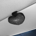 Black PU leather magnetic clip for car sun visor holding sunglasses, 8.0 cm by 7.3 cm.