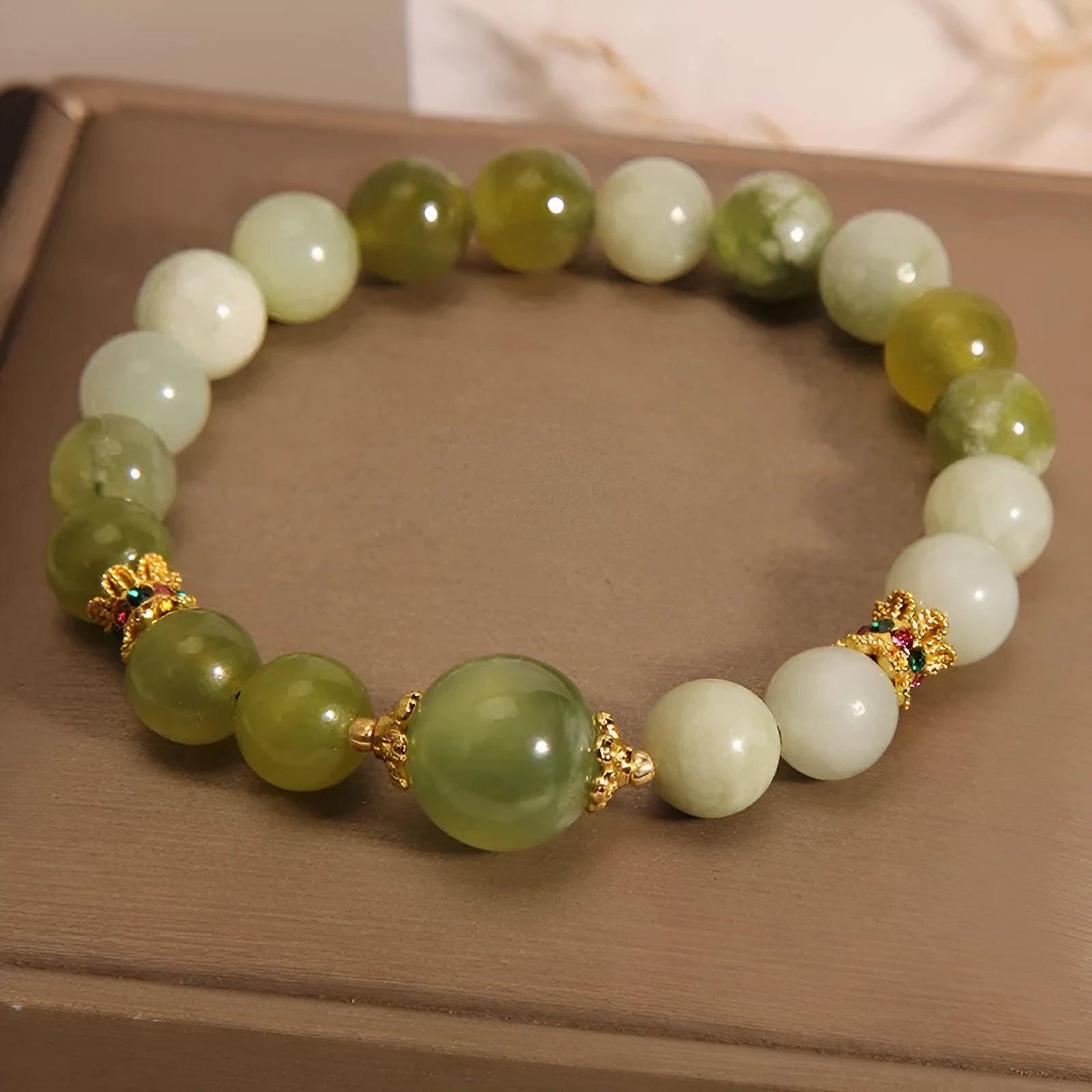 Women's jade green bracelet made from Xiuyan jade stone with adjustable cord