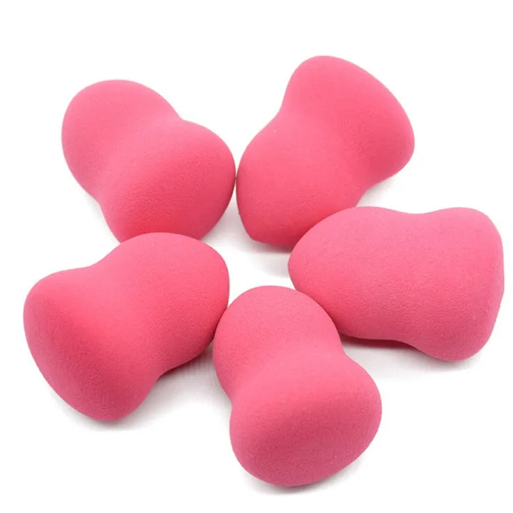 Pink hydrophilic makeup foundation sponge measuring 4cm by 4cm by 5.6cm for wet and dry application