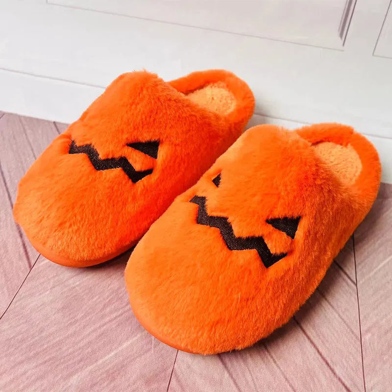 Orange Halloween pumpkin design plush slippers with coral velvet upper and flat PVC soles