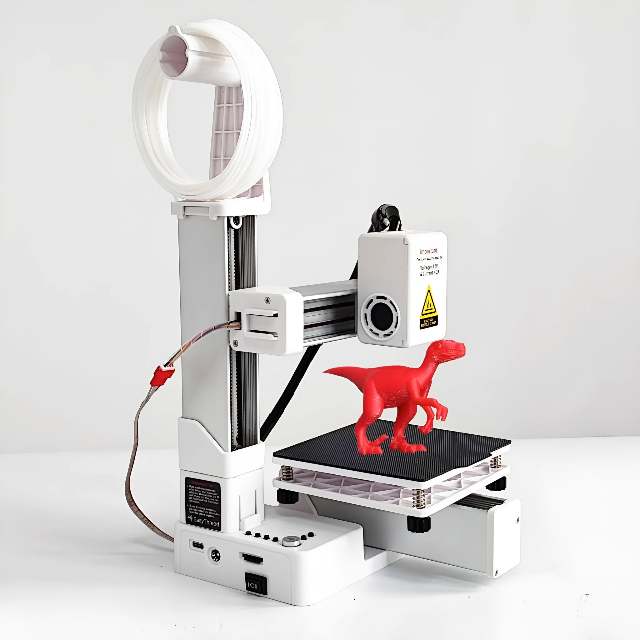 EasyThreed K10 white 3D printer on desk with TPU and PLA filament spools