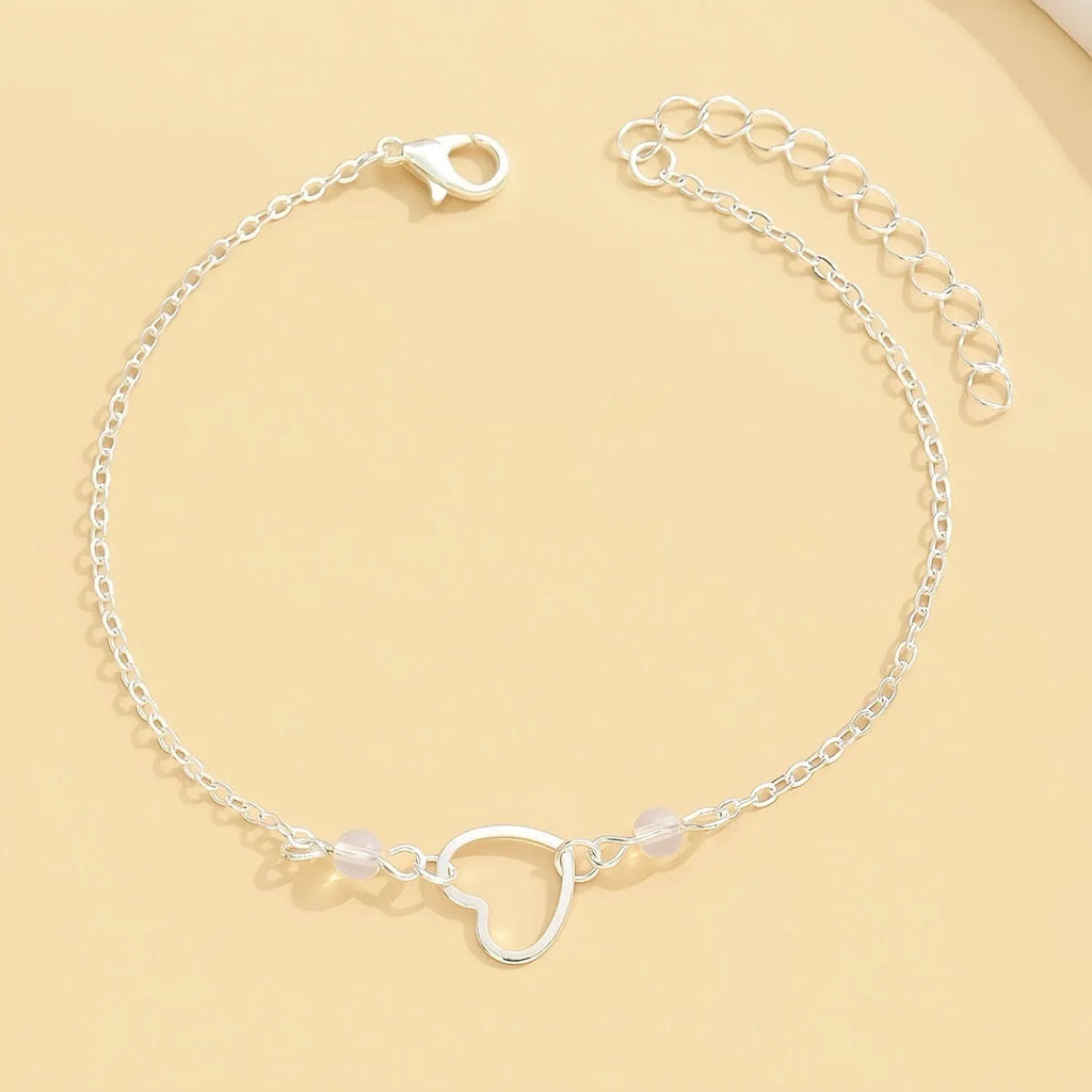 Women's adjustable anklet with heart pendant in gold or silver colour