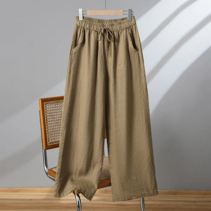 Women's straight-leg casual trousers with an elasticated drawstring waist in apricot colour