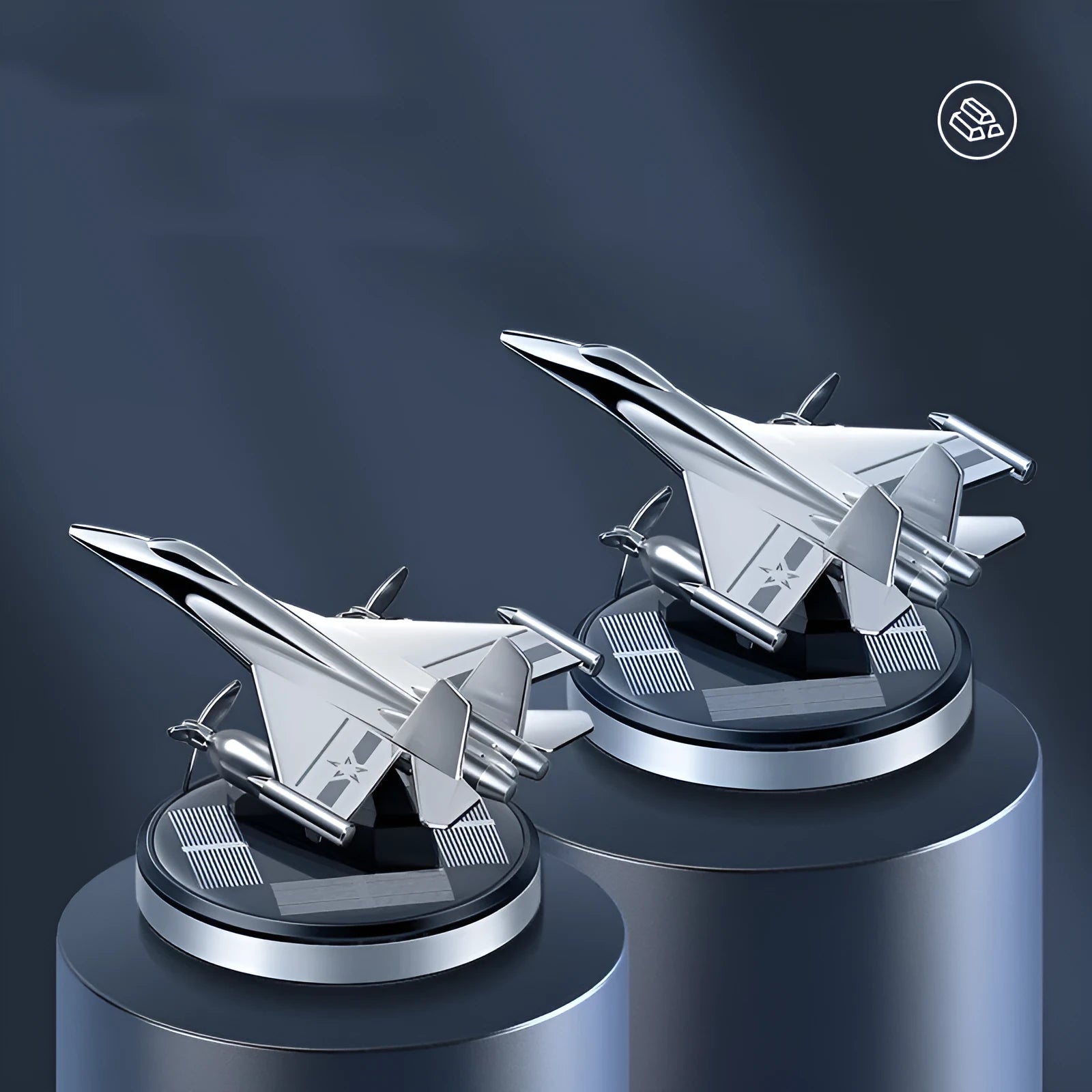 Solar powered rotating silver fighter aircraft perfume diffuser ornament on a car dashboard.