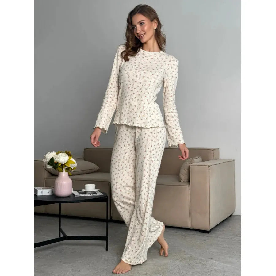 White floral print women's loungewear suit with bell sleeve top and wide-leg trousers
