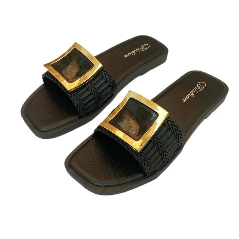 Women's apricot-coloured casual flat slippers with a textured PVC sole.
