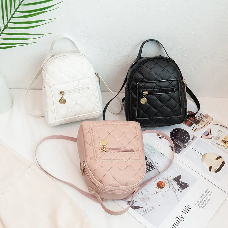 Korean style girls' embroidered PU backpack in white with hard shell construction and sandwich pocket