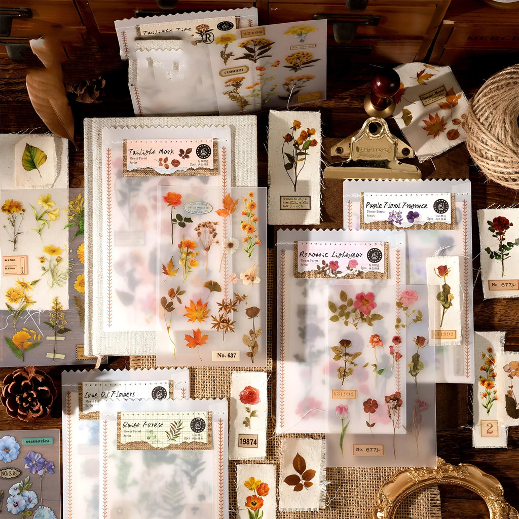 Huazhisen Series sticker material pack showing transfer paper and cotton linen sheets with forest and floral designs