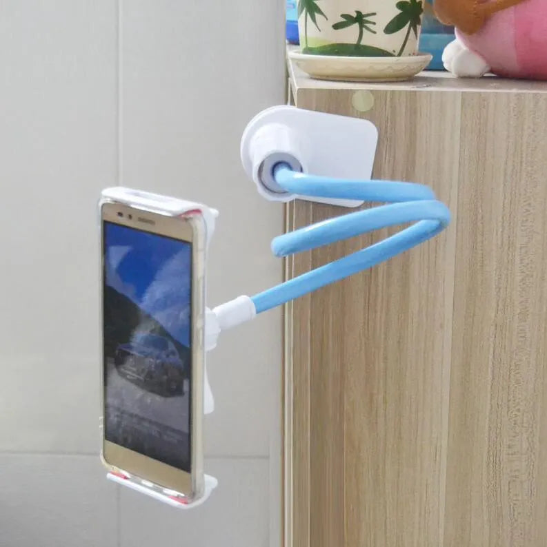 Black bedside oversize flat panel handset holder with long arm extended, holding a mobile phone.