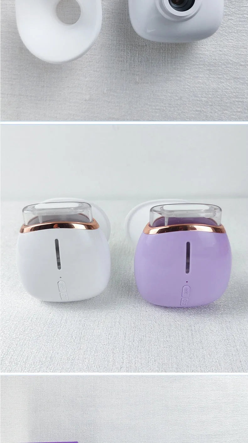 White and purple portable eye humidifier device with charging cable on display