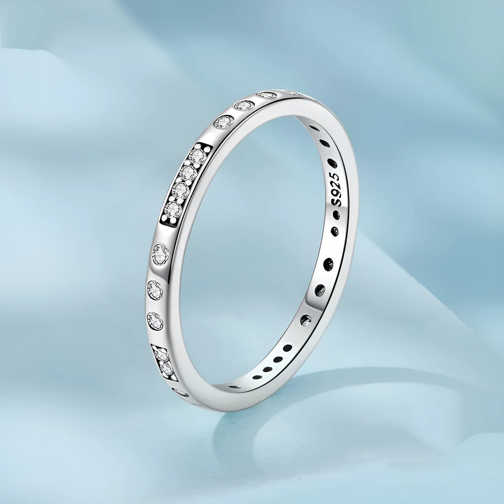 Black oxidised alloy ring with engraved 'I Love You' text, shown on a finger.