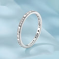 Black oxidised alloy ring with engraved 'I Love You' text, shown on a finger.