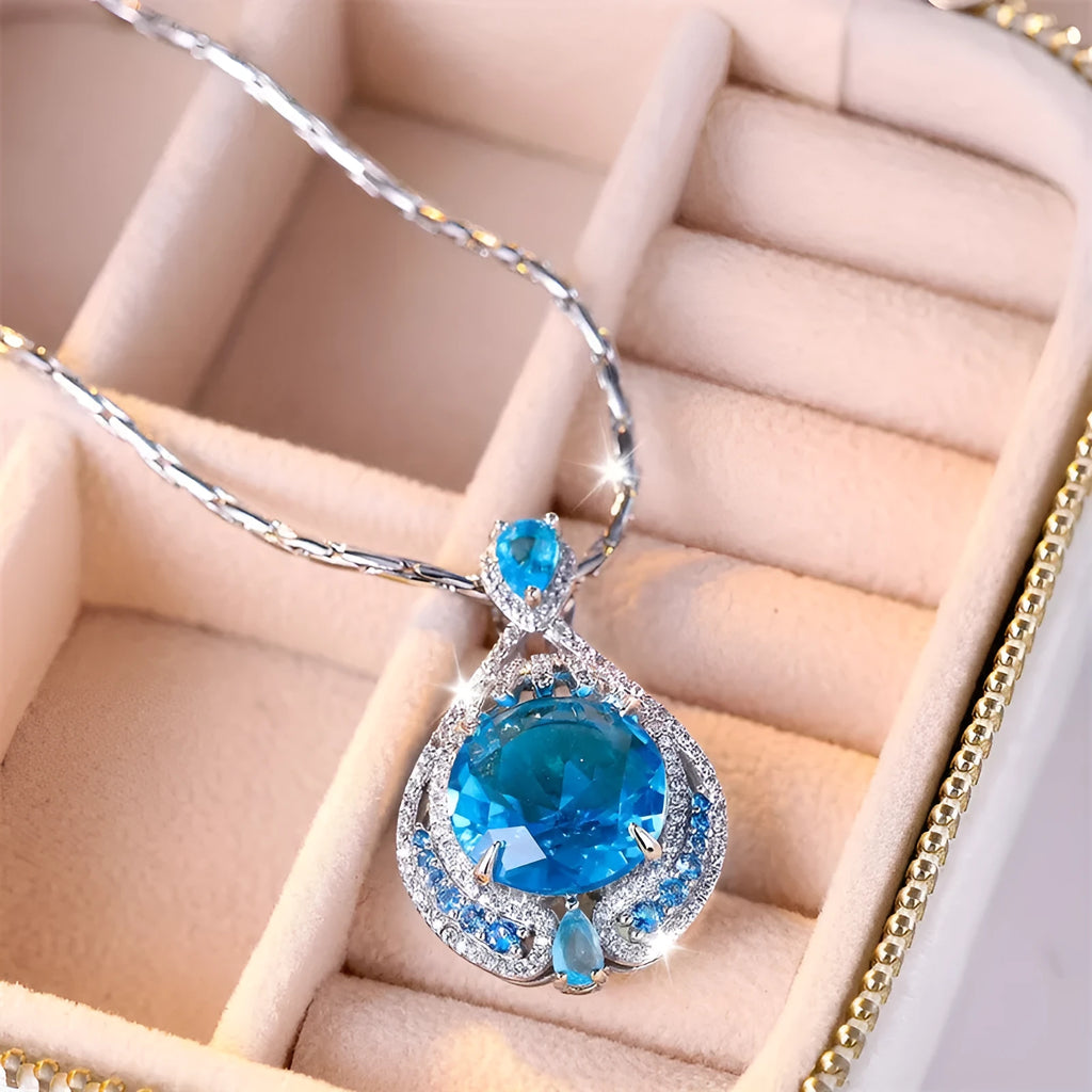 Blue geometric women's necklace with fireworks cut pendant on water wave chain