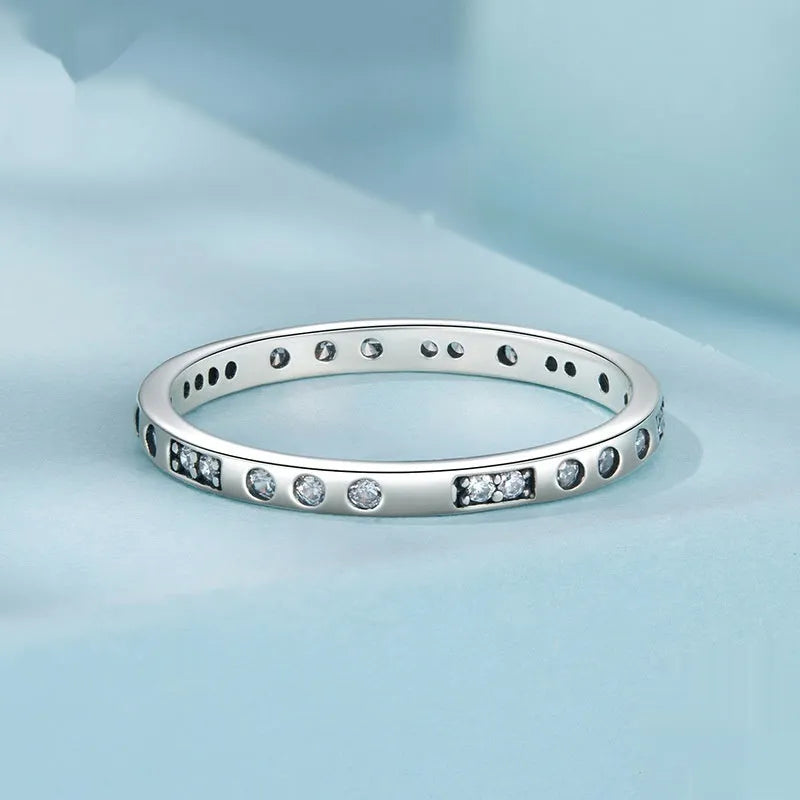 Black oxidised alloy ring with engraved 'I Love You' text, shown on a finger.
