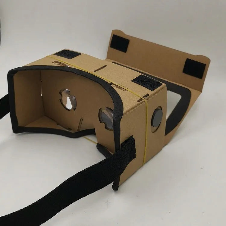 Pink and white cardboard VR glasses viewer for smartphones with 3D lenses.