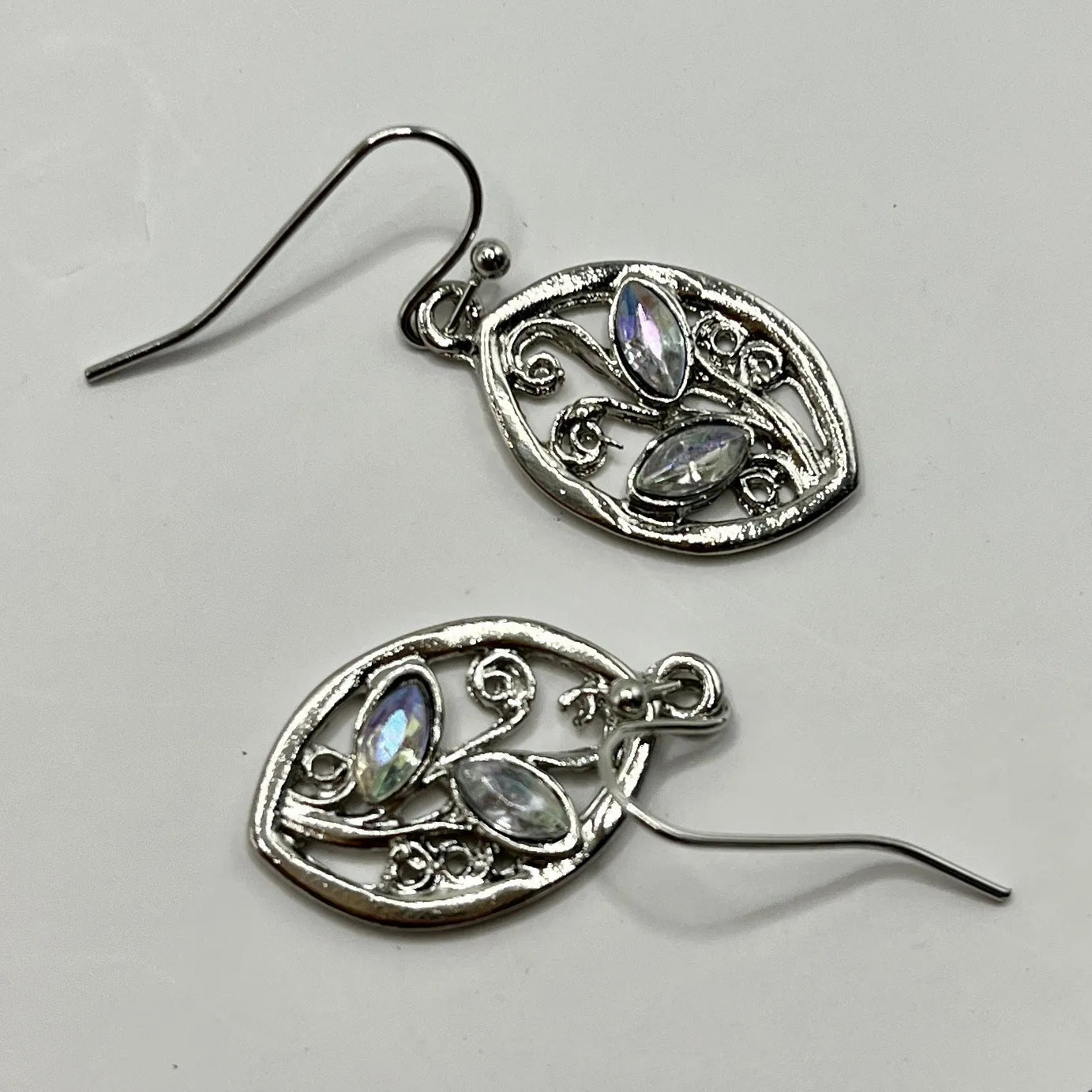 Silver women's earrings with leaf design and colourful embedded moonstones