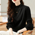 Women's slim fit half turtleneck pullover shirt in core-spun spandex with sunk stripe detailing