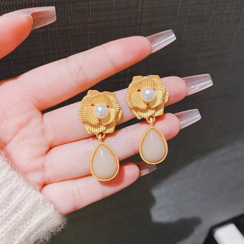 Gold alloy opal flower stud earrings with needle rose and pearl design Hong Kong style