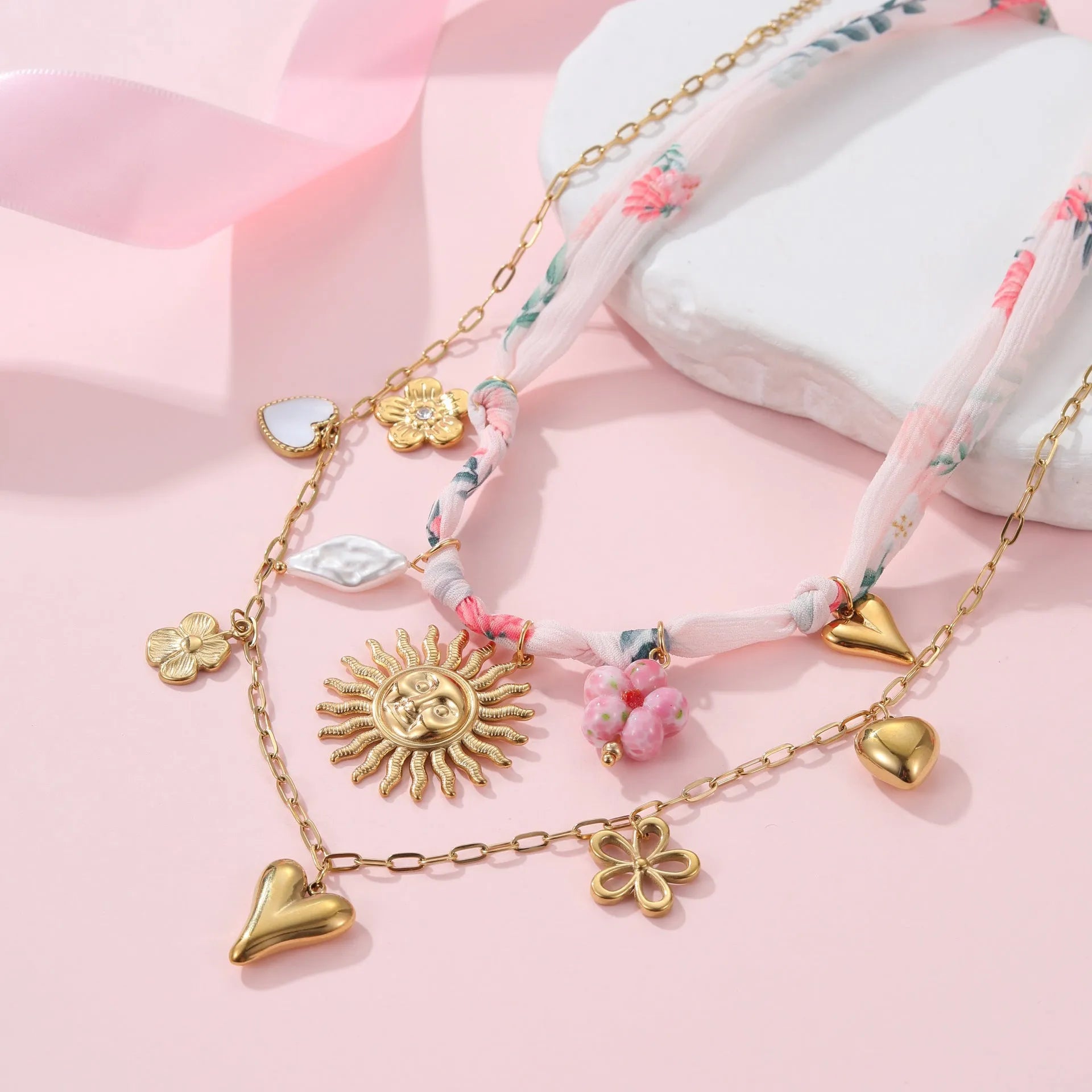 Stainless steel necklace with geometric sun pendant on adjustable 41-50cm chain, 18K gold plated finish