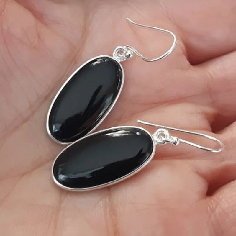 Women's geometric earrings with oval black agate pendants on silver-coloured alloy
