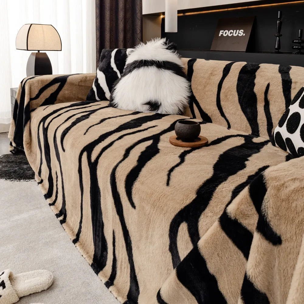 Zebra pattern flannel sofa cover with non-slip backing in caramel colour