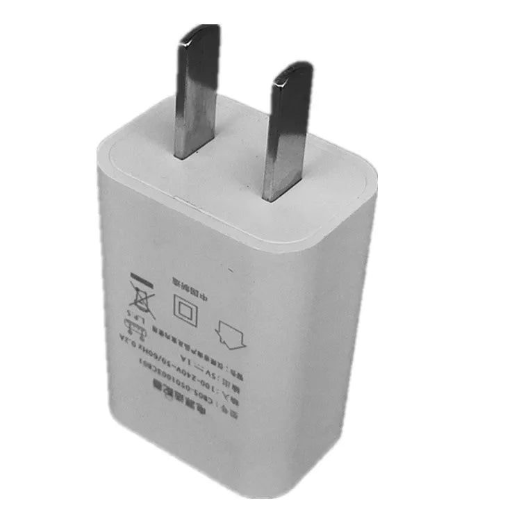 White standard power adapter with CE FCC marks and USB port for 5V charging