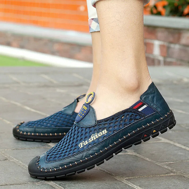 Men's brown casual mesh shoes with a rounded toe and sewn rubber sole.