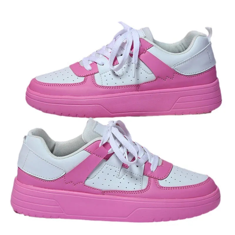 Casual solid colour low top sports shoes with front lace-up, round toe, and metal accents on a white background