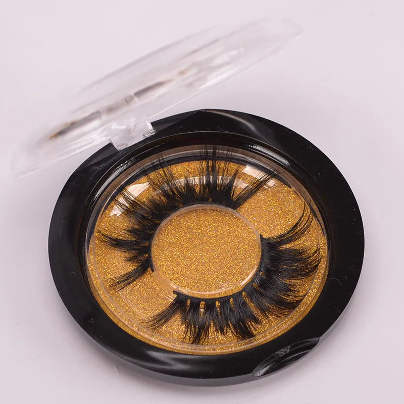5D mink hair false eyelashes set with applicator brush and storage cap on white background
