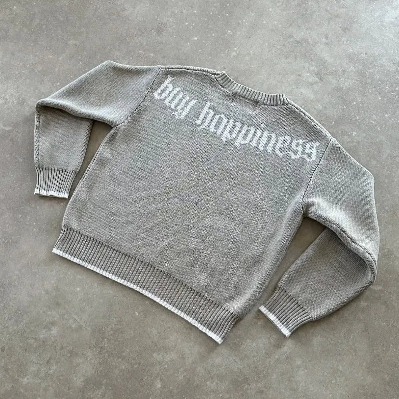 Grey jacquard loose-fitting knitwear coat with long sleeves on hanger