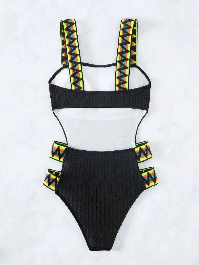 Women's solid black one-piece swimming suit bikini on a mannequin