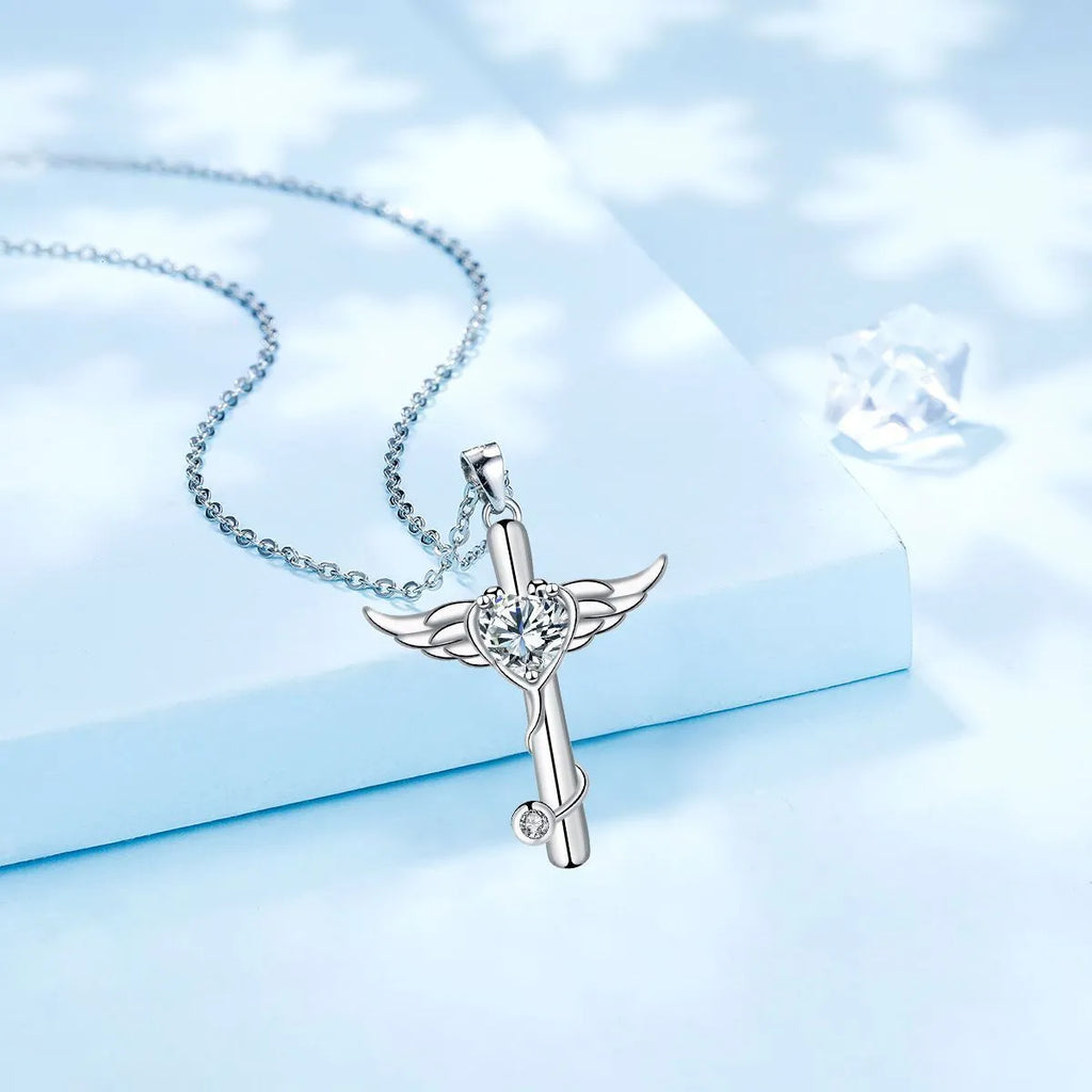 Wings cross stethoscope pendant necklace in copper with electroplated white or red diamond finish.