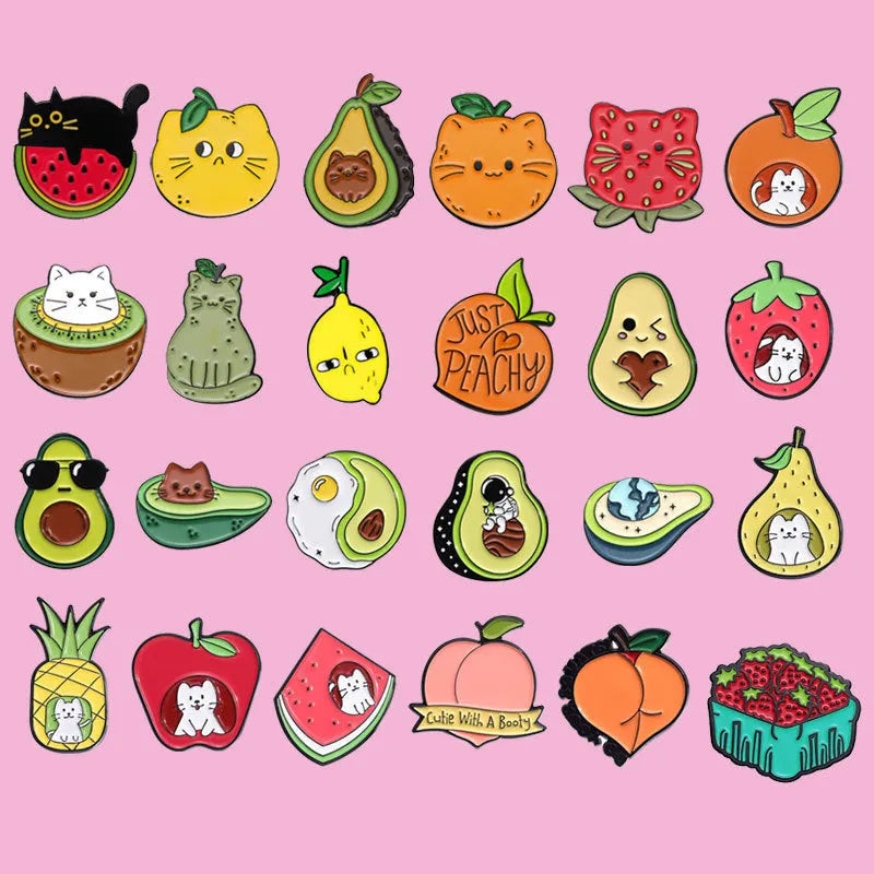 Colourful cartoon fruit shaped letter brooch made from metal zinc alloy with a pin back.